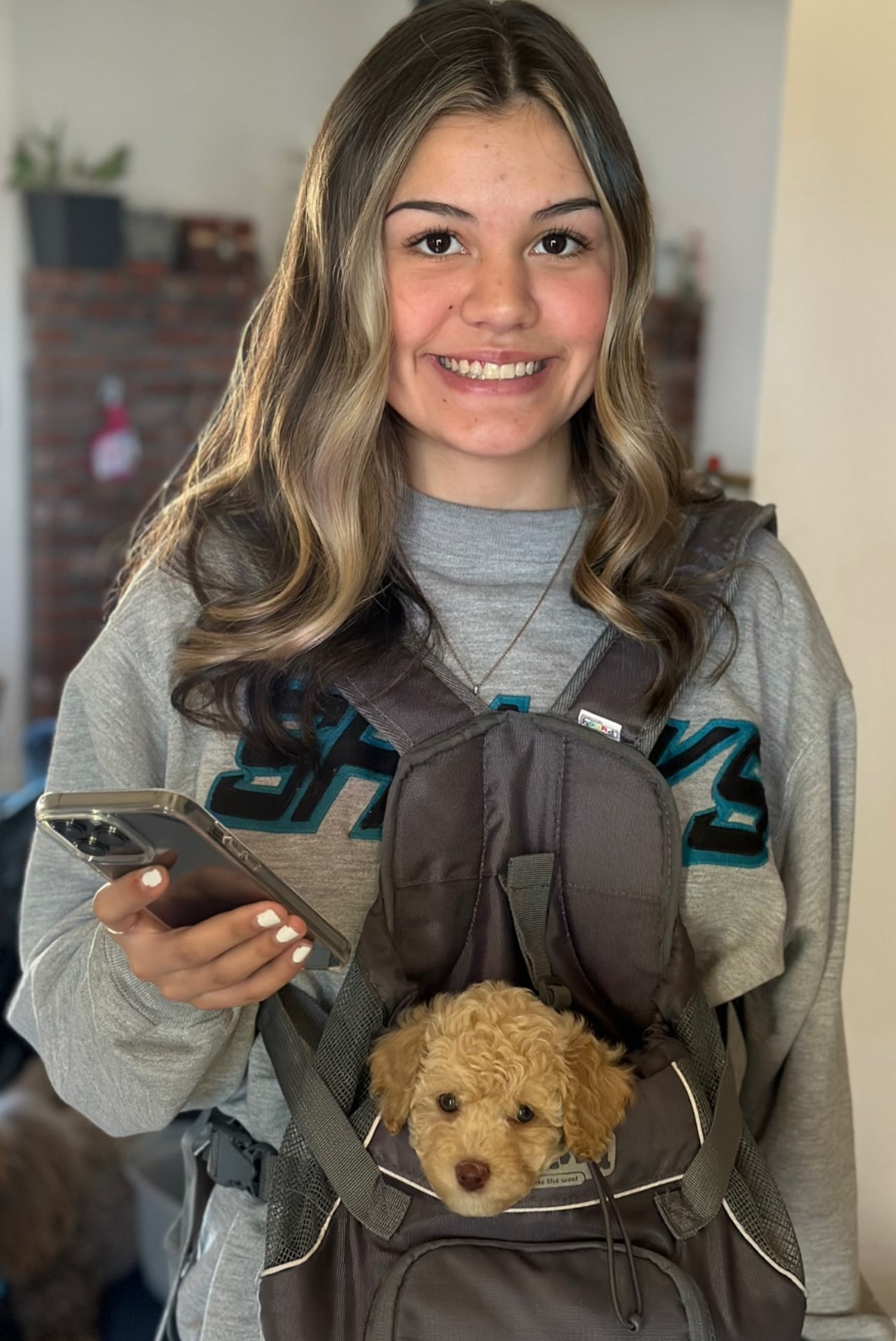 child holding puppy